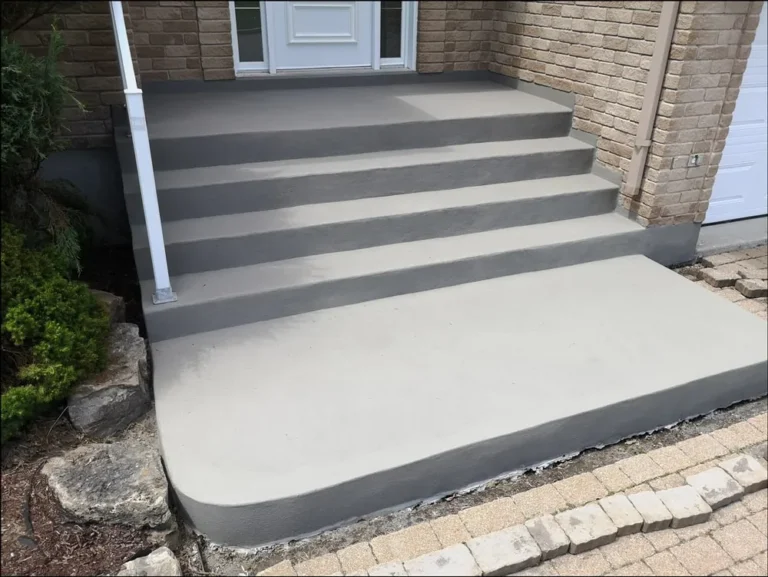 Concrete steps and landing at a home entrance